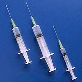 Syringes with mounted needle